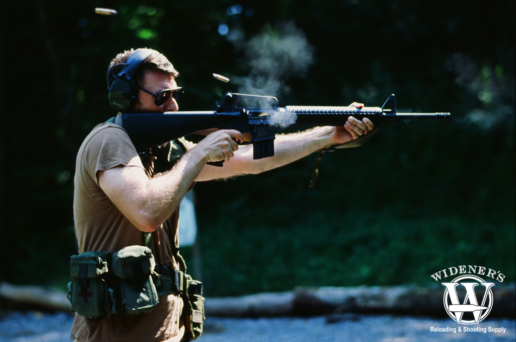 man shooting a 3 round burst a photo of a man shooting a 3 round burst
