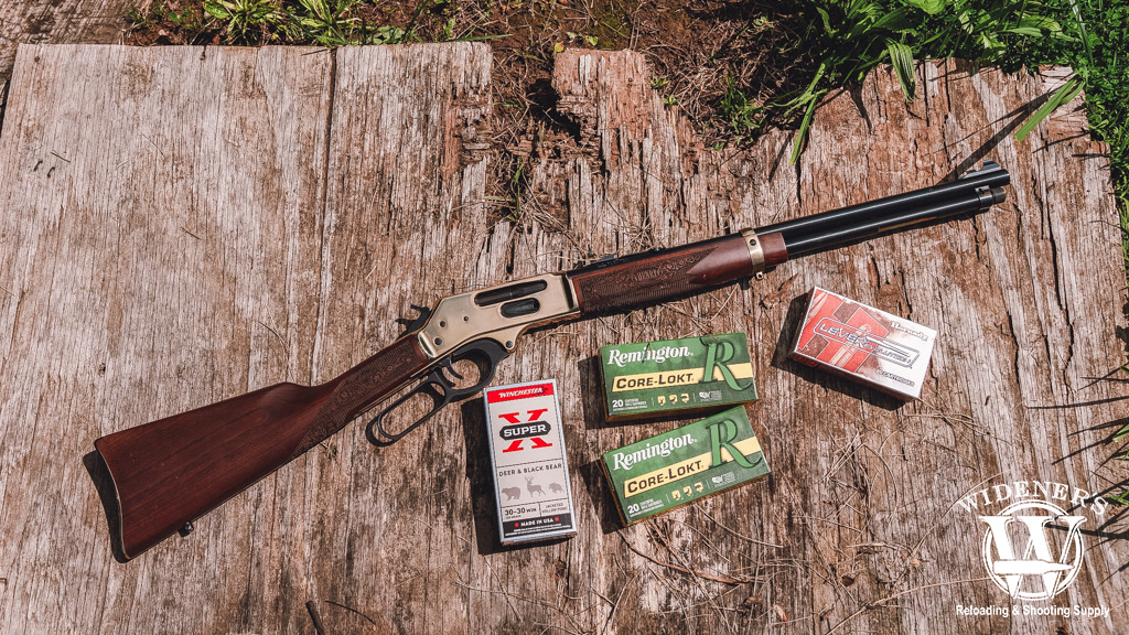 henry lever action rifle with ammo a photo of a henry lever action rifle with ammo