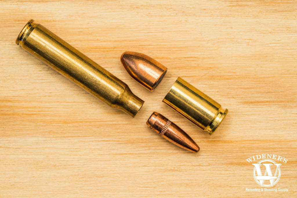 a photo of rifle and pistol caliber fmj bullets disassembled 