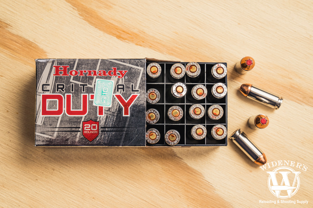 photo of hornady critical duty 10mm ammo on plywood