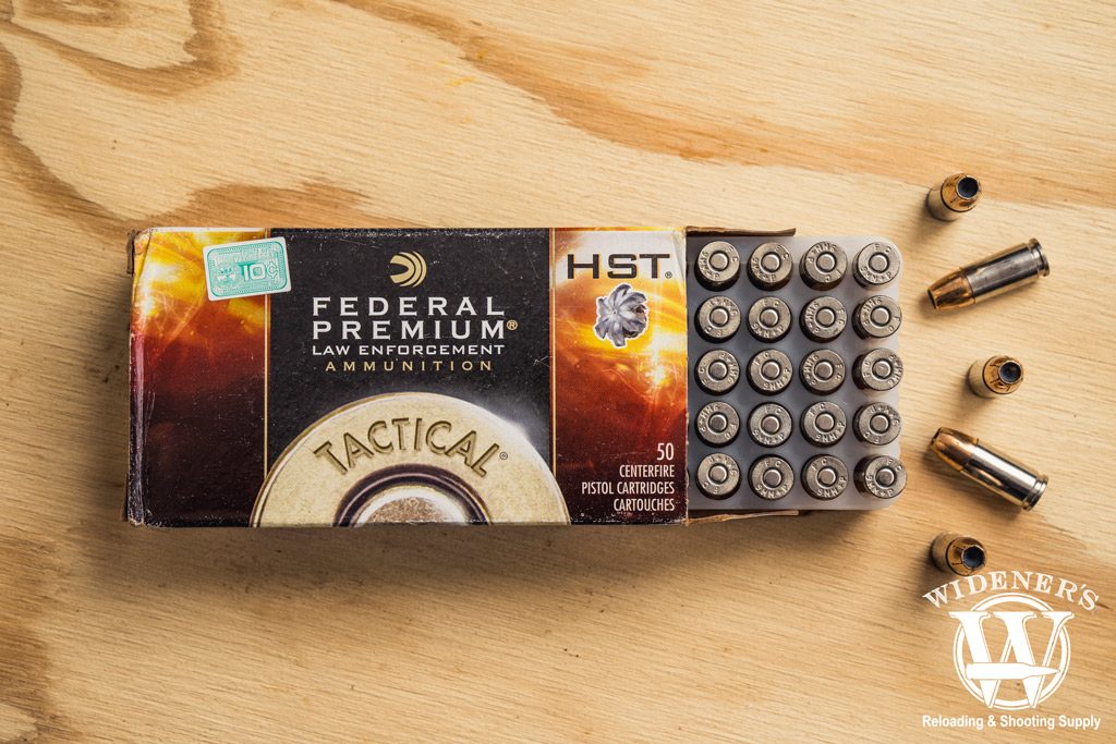 federal HST premium law enforcement 9mm JHP ammunition photo of federal HST premium law enforcement 9mm JHP ammunition on plywood