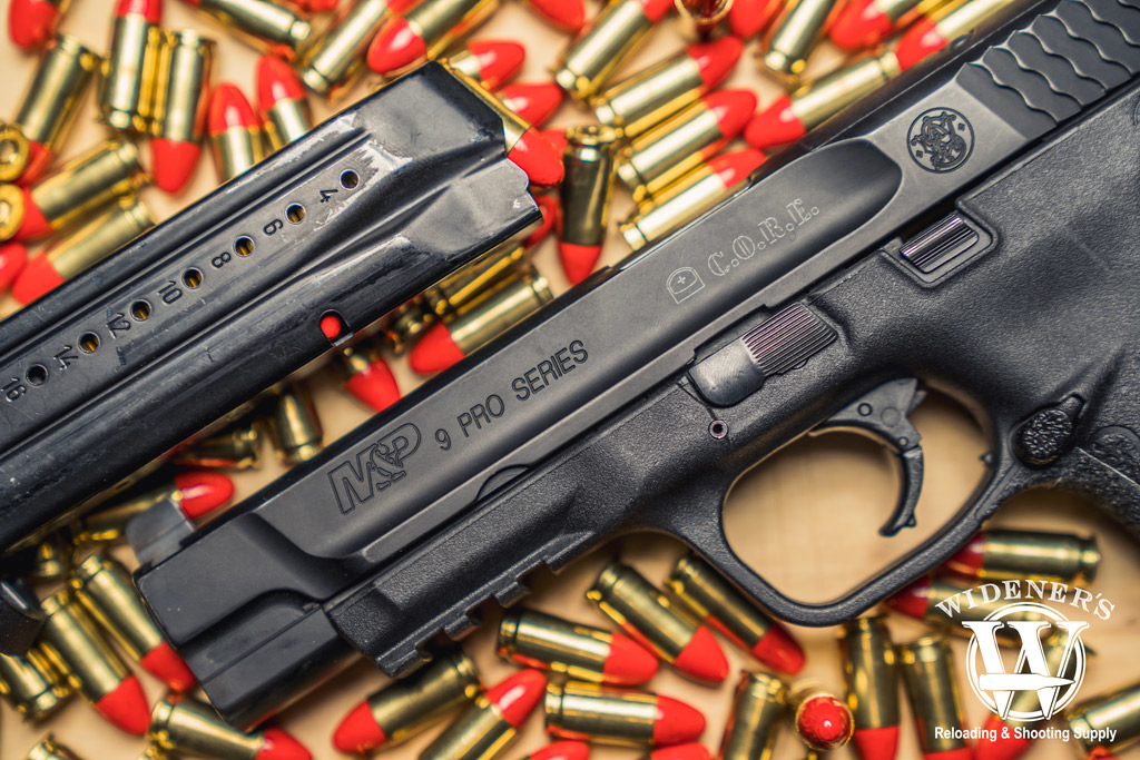 smith and wesson M&P 9 pro series pistol with federal syntech ammo a photo of a smith and wesson M&P 9 pro series pistol with federal syntech ammo