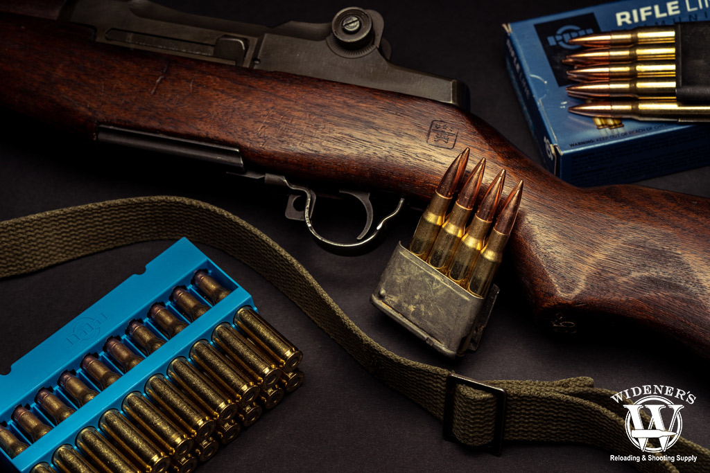 m1 garand with magazines and 30-06 ammo a photo of the m1 garand with magazines and 30-06 ammo