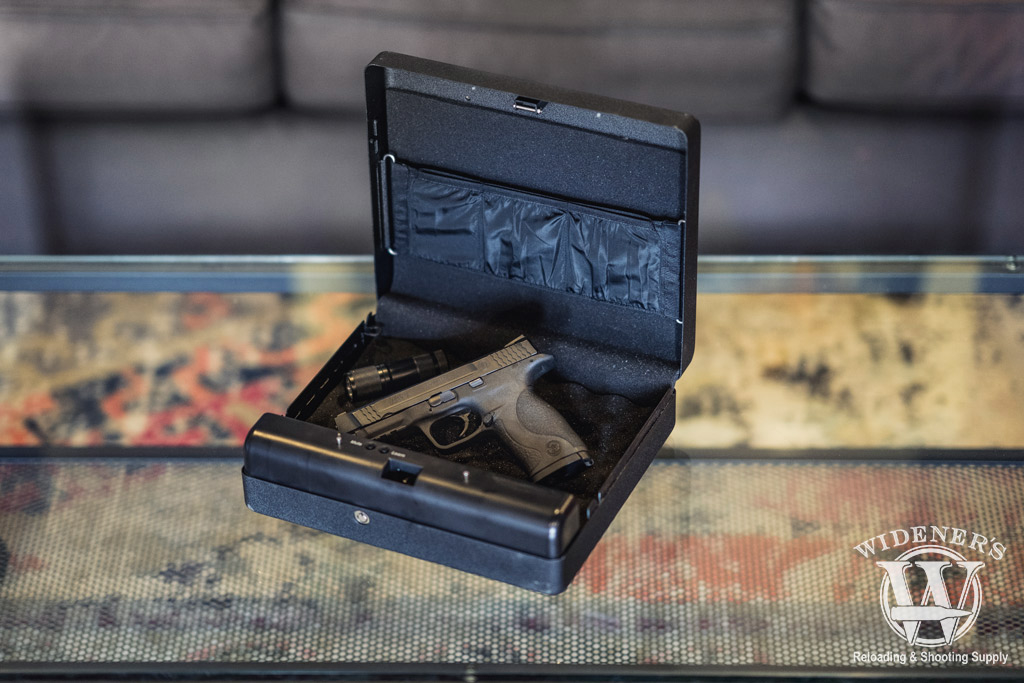 smith and wesson pistol sitting in a safe used as the best home defense a photo of a smith and wesson pistol sitting in a safe used as the best home defense