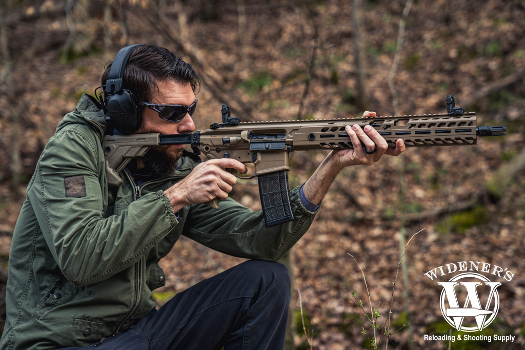 a photo of a man explaining how fast do bullets travel