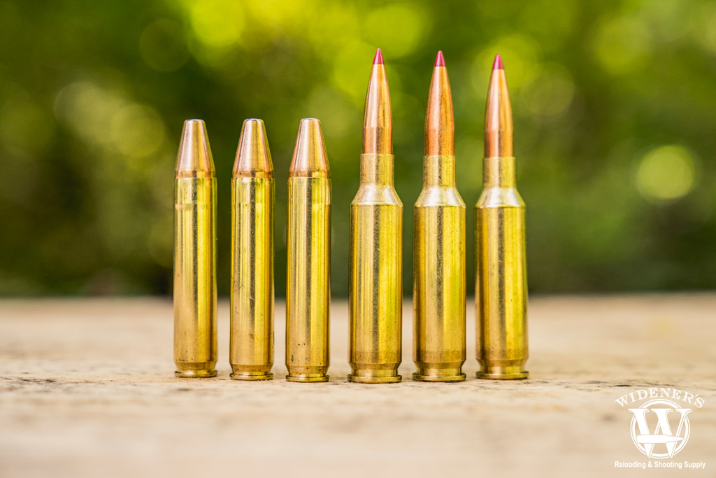 350 legend ammo compared to 6.5 creedmoor ammo A photo of 350 legend ammo compared to 6.5 creedmoor ammo outdoors
