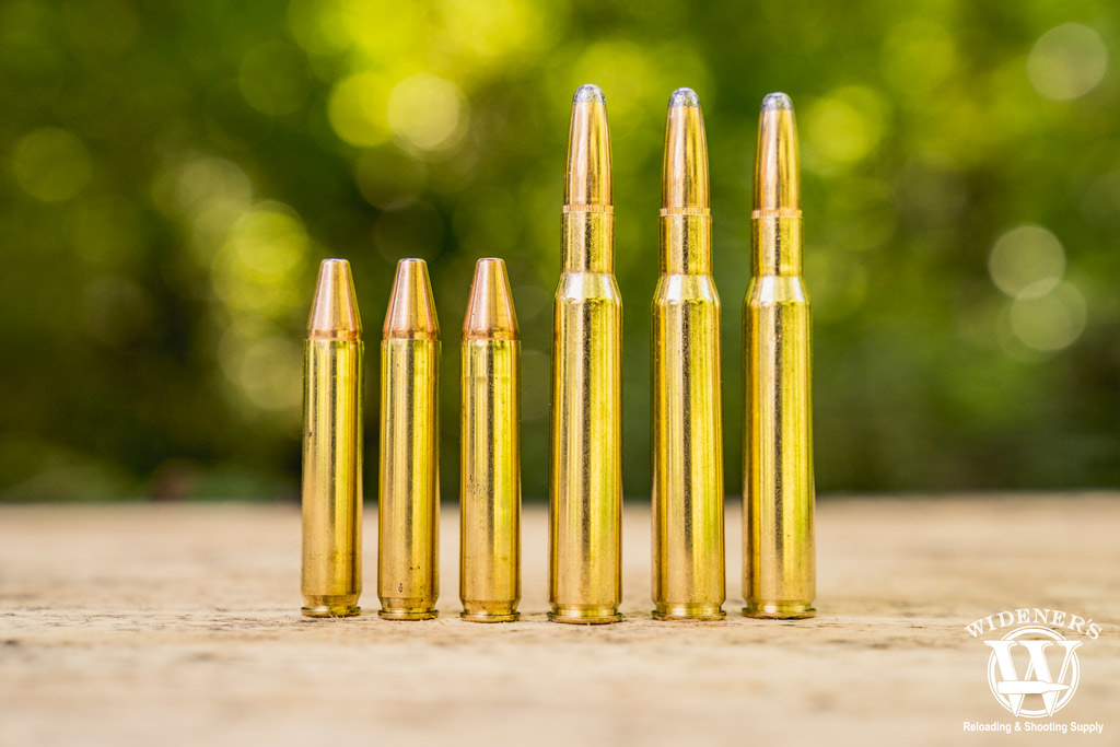 350 legend ammo next to 30-06 ammo a photo of 350 legend ammo next to 30-06 ammo outdoors