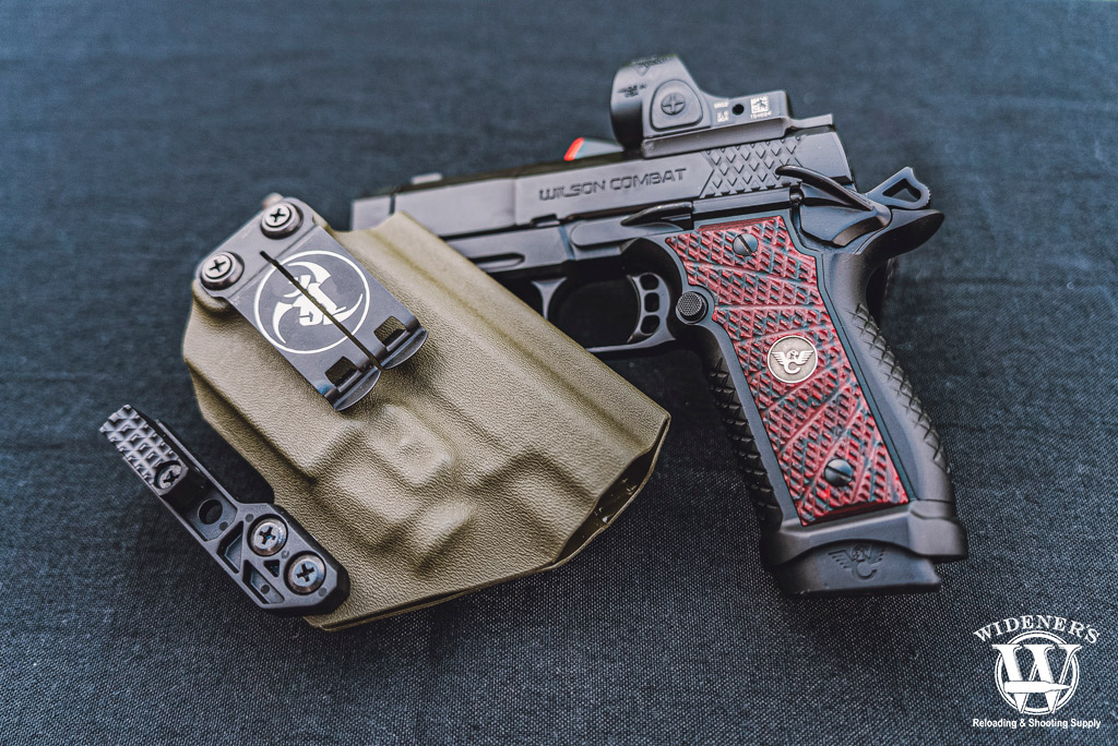 a photo of an edc handgun with anr designs holster