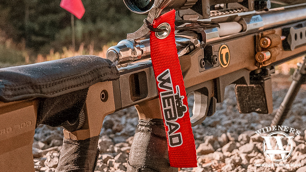 a chamber flag in a bolt action rifle. a photo of a chamber flag in a bolt action rifle.