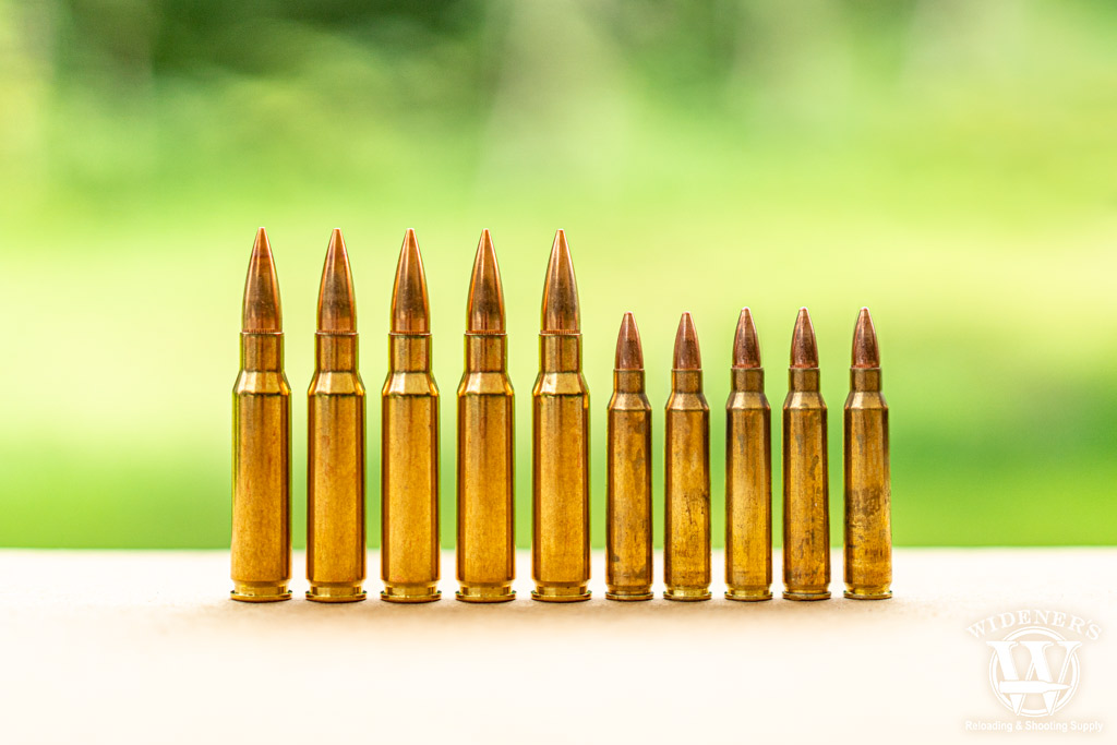 a photo comparing 223 VS 308 cartridges