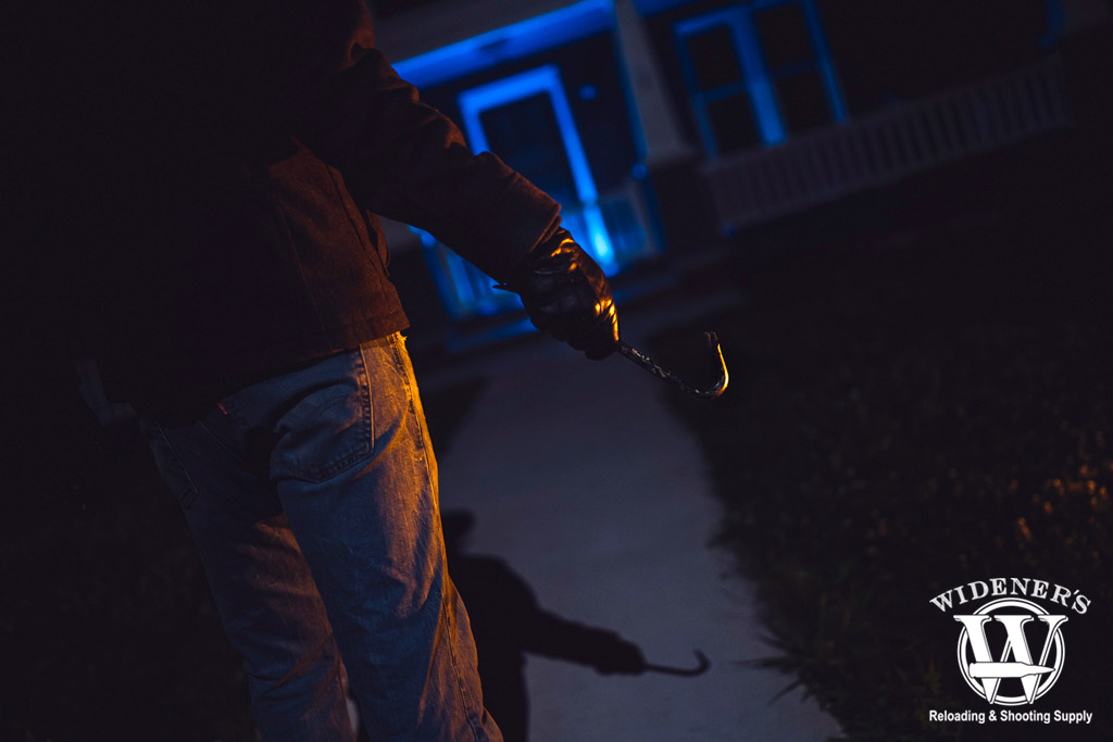a man breaking into a home a photo of a man breaking into a home