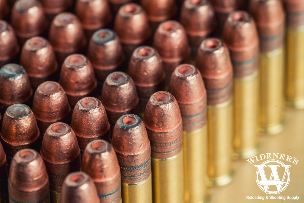 a macro photo of hollow point rimfire ammunition