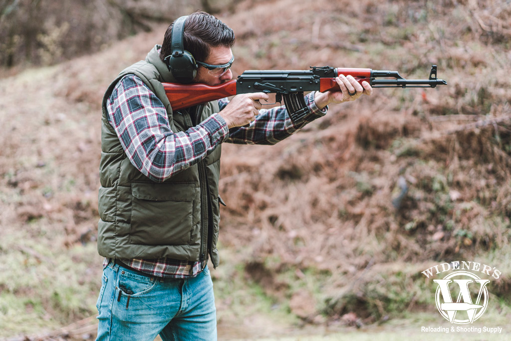 shooting an ak-47 at a gun range a photo of a man shooting an ak-47 at a gun range