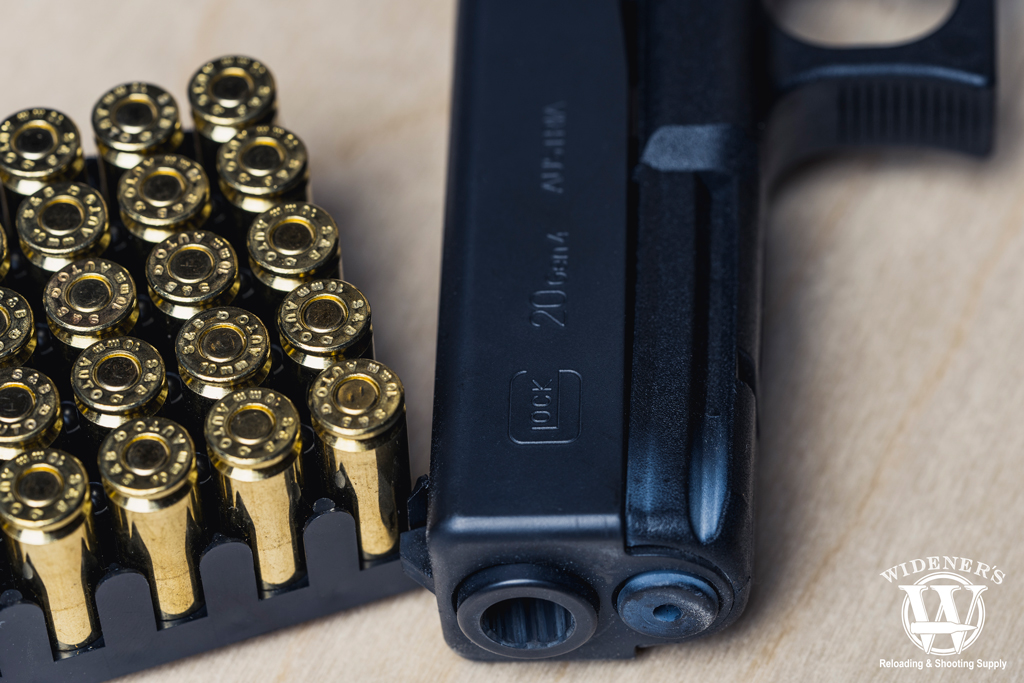 glock 20 handgun and 10mm ammo a photo of a glock 20 handgun and 10mm ammo