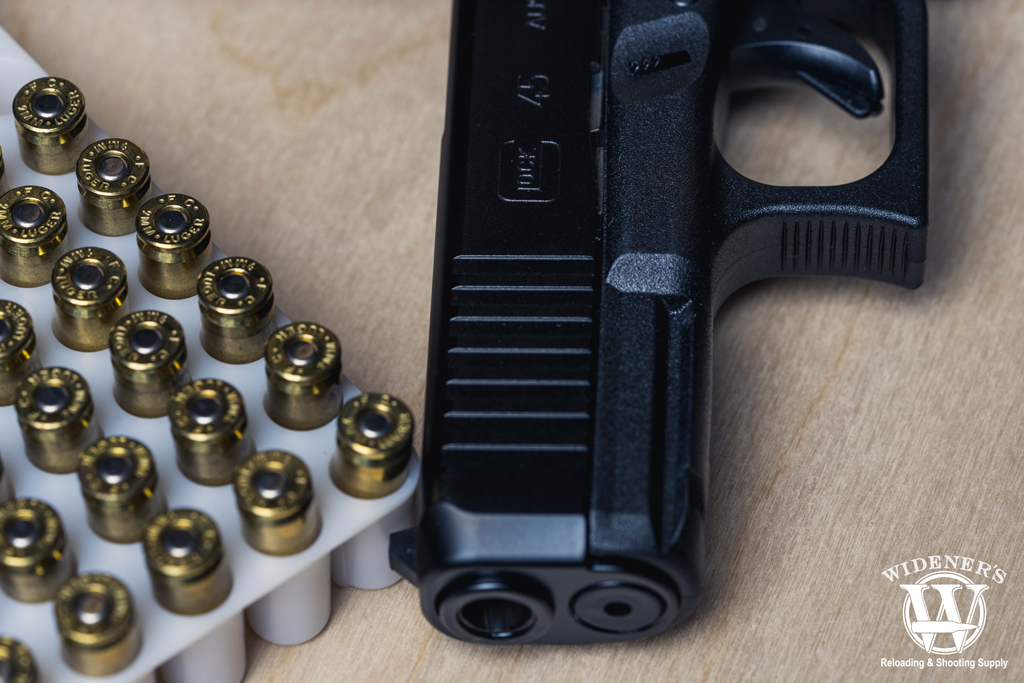 glock 45 handgun and 9mm ammo a photo of a glock 45 handgun and 9mm ammo