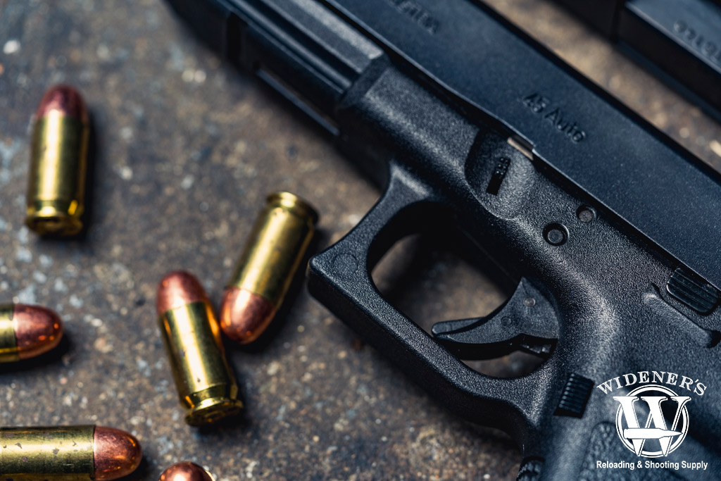 a glock pistol with ammo a macro photo of a glock pistol with ammo