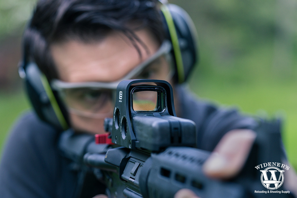 rifle with holographic sights a photo of a rifle with holographic sights