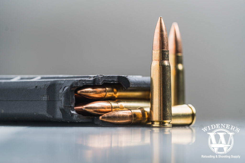 brass cased ammo with a magazine a photo of brass cased ammo with a magazine