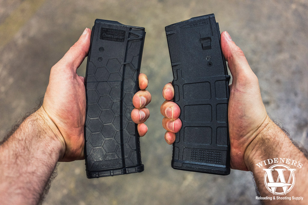 comparing pmag vs hexmag a photo of a man comparing pmag vs hexmag