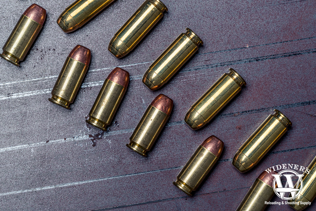 comparing the 40 S&W VS 10mm A photo comparing the 10mm cartridge on the top, and the .40 S&W cartridge on the bottom
