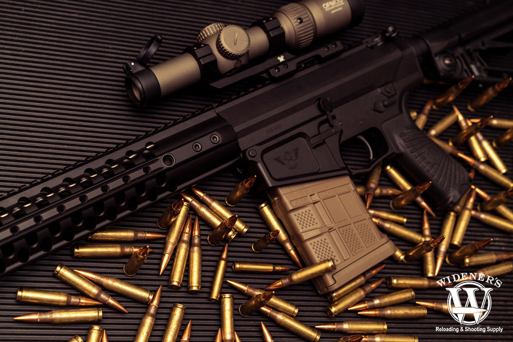 ar-10 rifle with 308 caliber ammo a photo of a ar-10 rifle with 308 caliber ammo