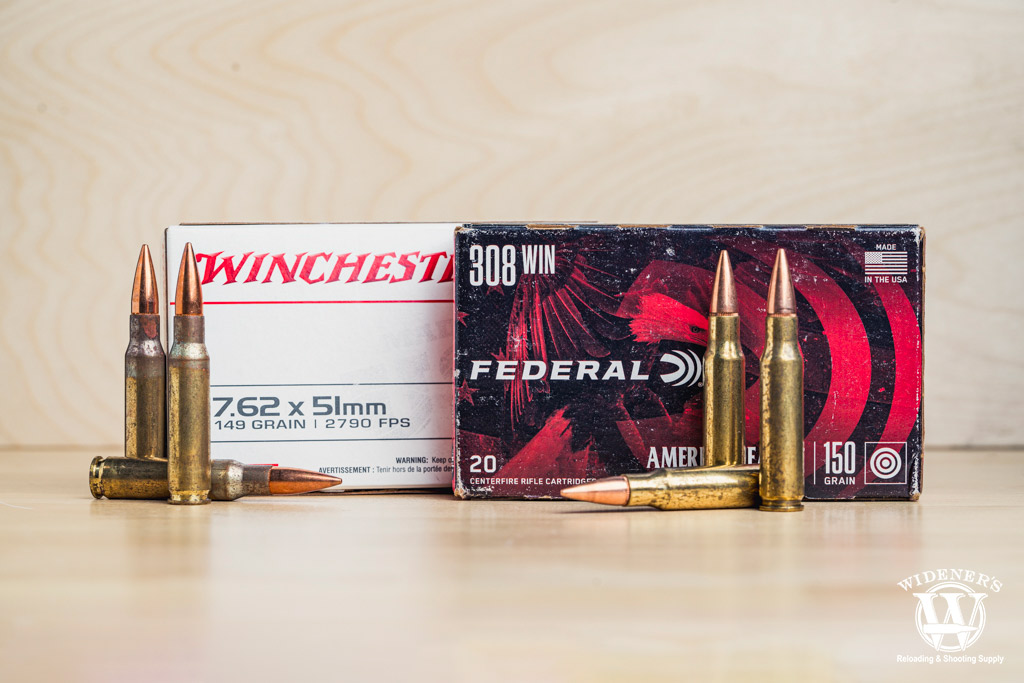 a photo comparing 308 vs 7.62.51mm ammo