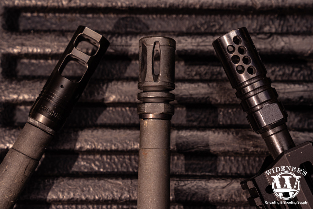 a photo of a flash hider, muzzle break and compensator