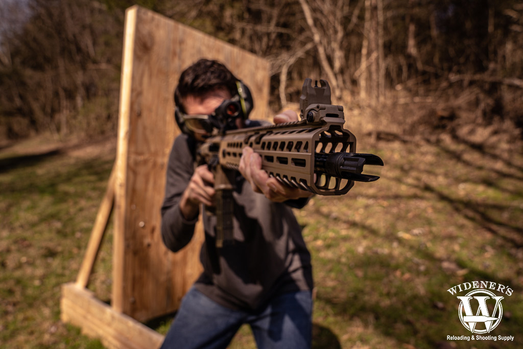 photo of a man shooting 300 blk rifle outdoors