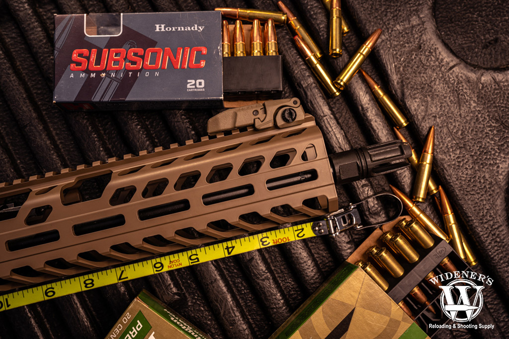 photo of sig sauer rifle and 300 blk ammo