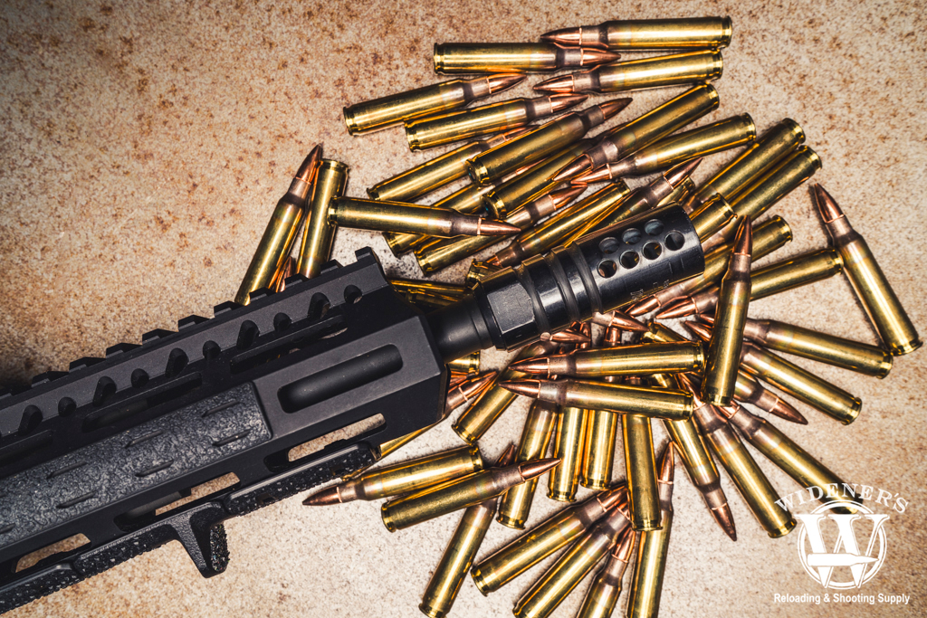 a photo of a rifle compensator with 223 ammo