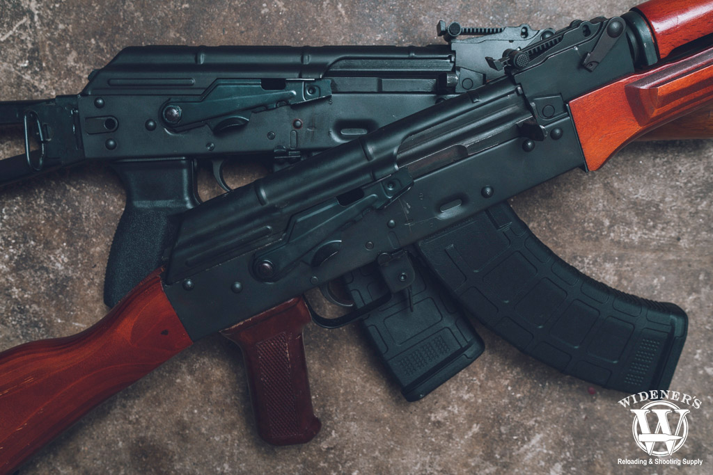 comparing AK-47 VS AK-74 style rifles a photo comparing AK-47 VS AK-74 style rifles