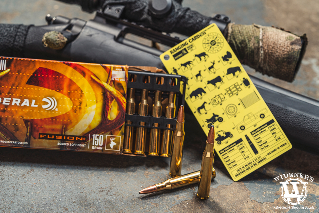 a bolt action rifle and hunting ammo a photo of a bolt action rifle and hunting ammo