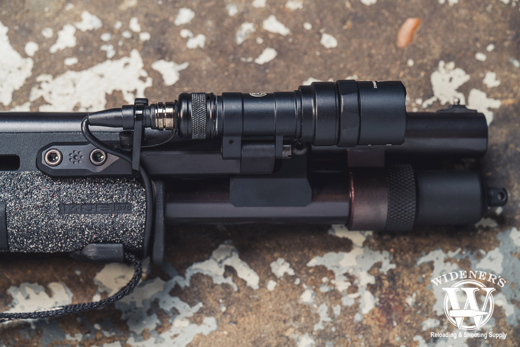 T-Rex Arms Lightbar PRO Mount with a surefire mini scout pro flashlight a photo of T-Rex Arms Lightbar PRO Mount with a surefire mini scout pro flashlight