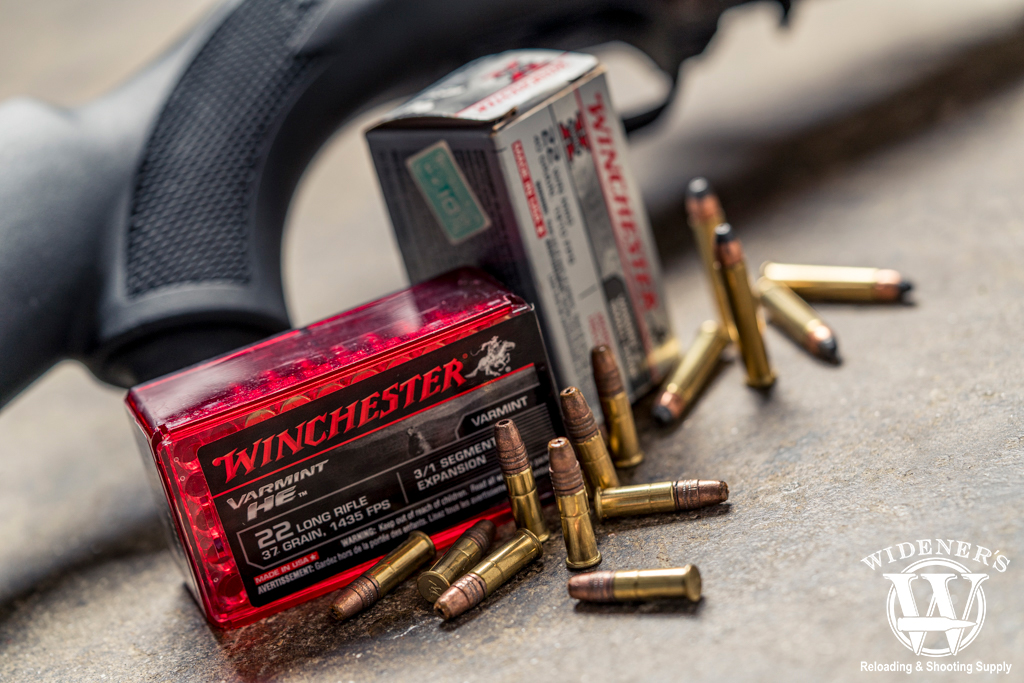 a rimfire rifle and ammo a photo of a rimfire rifle and ammo