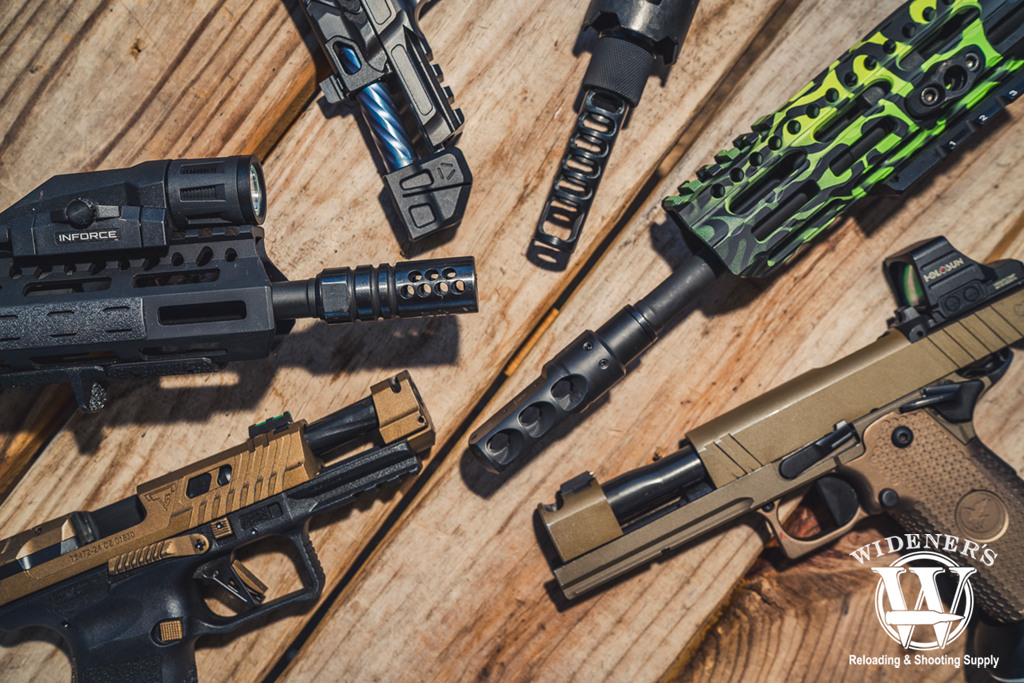 comparing pistol and rifle compensators a photo comparing pistol and rifle compensators