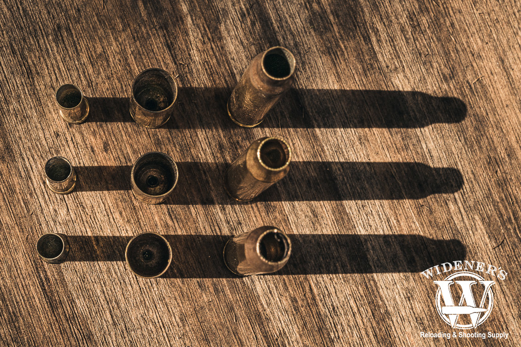 22LR, 9mm and 223 brass casings a photo of 22LR, 9mm and 223 brass casings