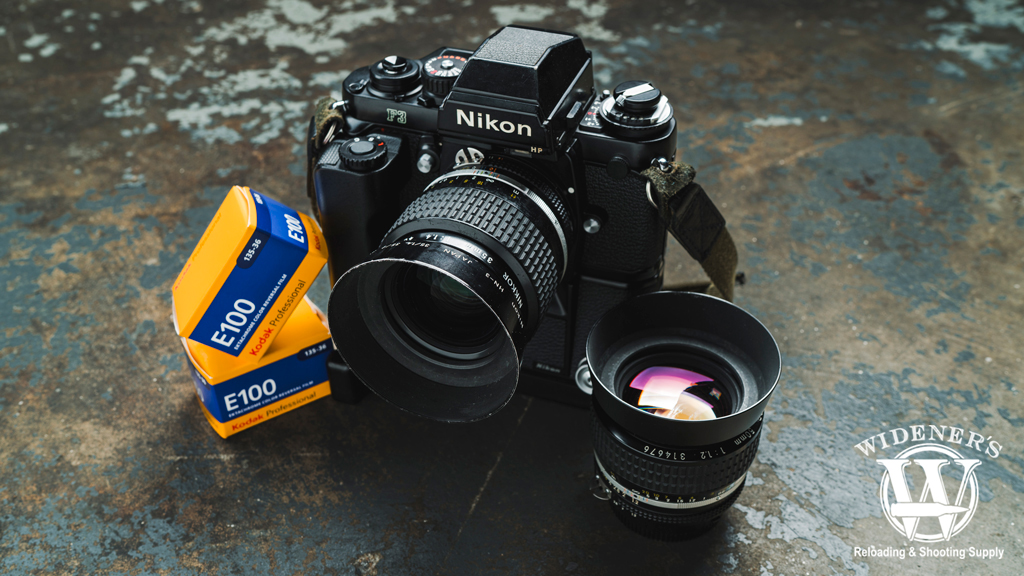 nikon f3 HP camera with md-4 motor drive and mk-1 firing rate converter a photo of a nikon f3 HP camera with md-4 motor drive and mk-1 firing rate converter
