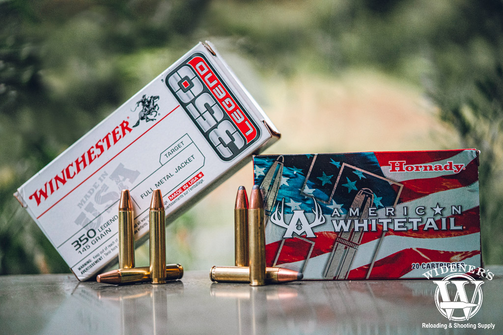 a photo comparing 350 Legend VS 223 ammo