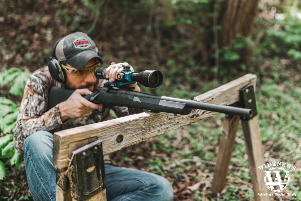 a deer hunter in the woods a photo of a deer hunter in the woods