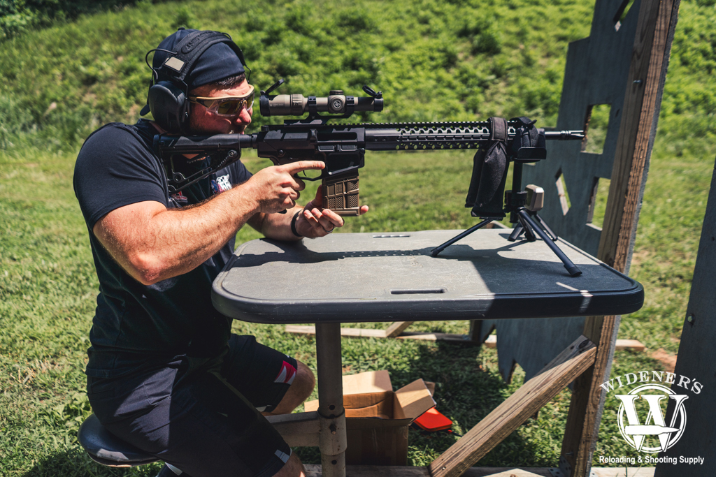 NASCAR Cup Series driver Chad Finchum firing an AR-10 rifle a photo of NASCAR Cup Series driver Chad Finchum firing an AR-10 rifle