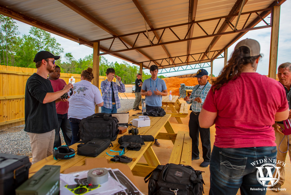 female NRA instructor teaching a NRA CCW pistol class outdoors a photo of a female NRA instructor teaching a NRA CCW pistol class outdoors