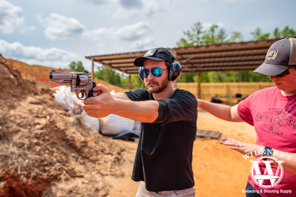 a female instructor answering concealed carry class instructions a photo of a female instructor answering concealed carry class instructions