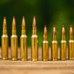 a photo comparing 6.5 creedmoor vs 6.5 grendel ammo
