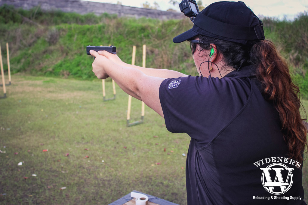 a female competition shooter at a gssf match photo of a female competition shooter at a gssf match outdoors