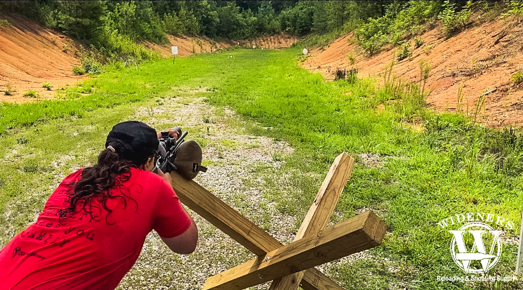 The author firing a rifle at a NRL22 match The author shooting a 22LR rifle at a NRL22 match