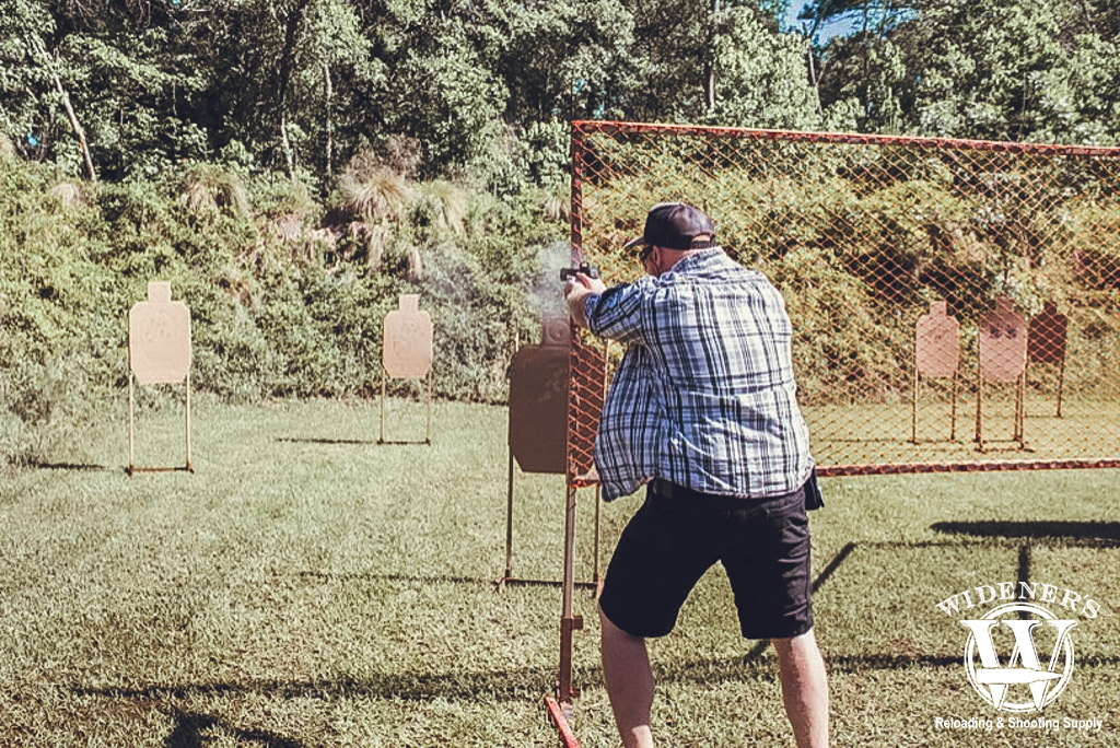 an idpa shooting competition a photo of a man at an idpa shooting competition