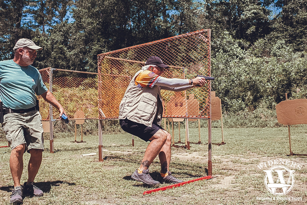 a competition shooter in action a photo of a competition shooter in action