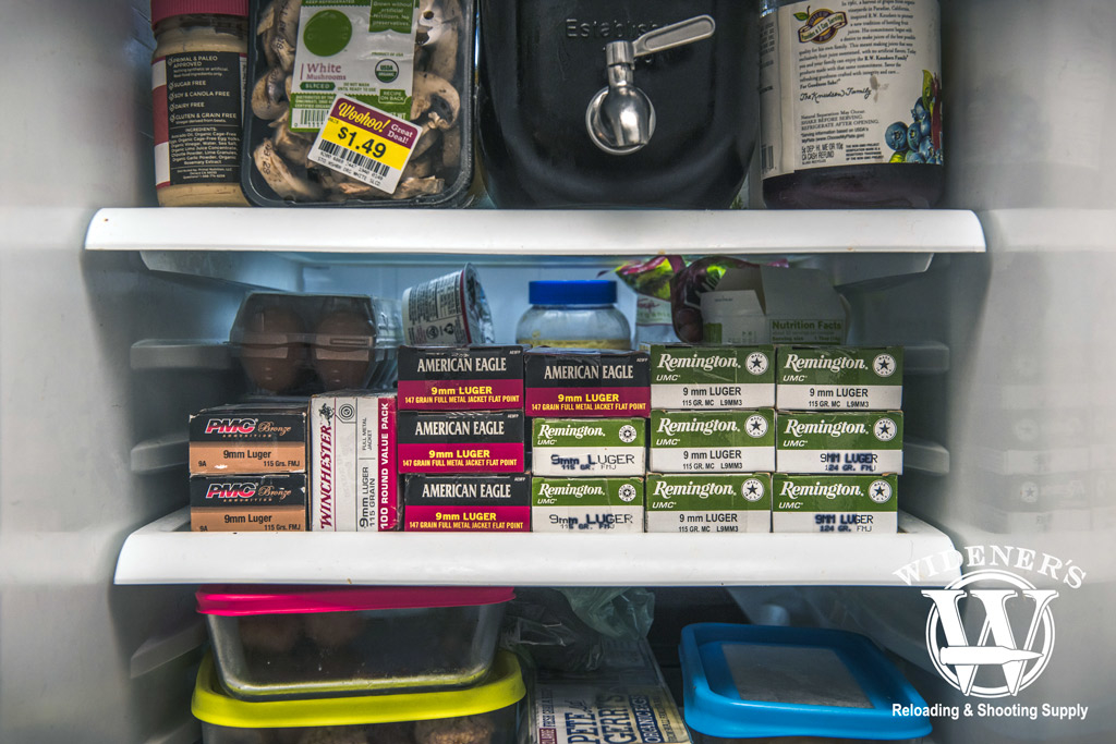 ammunition stacked on the shelf being stored in a refrigerator photo of ammunition stacked on the shelf of a refrigerator