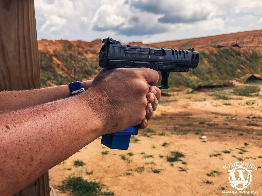 a competition pistol being shot at a gun range a photo of a competition pistol being shot at a gun range