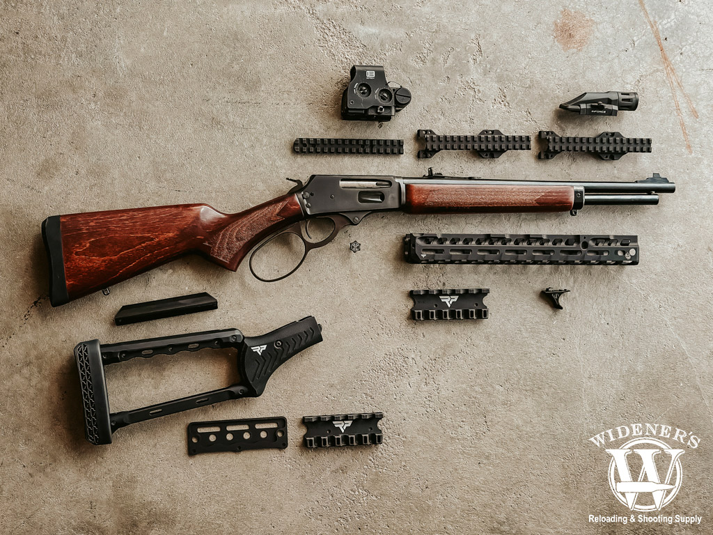 modern lever action rifle and accessories a photo of a modern lever action rifle and accessories
